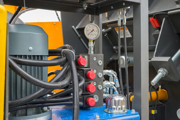 Hydraulic tubes fittings and measuring instrument on control panel
