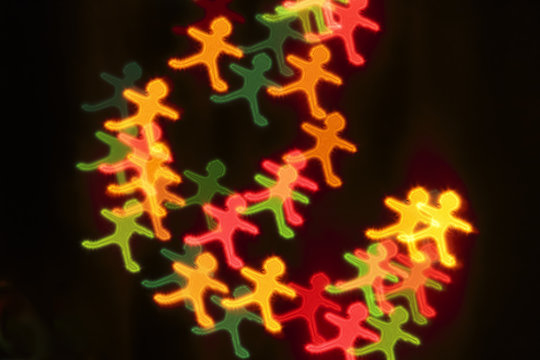 Colorful bokeh shaped of gingerbread man.