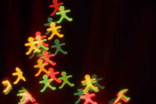 Colorful bokeh shaped of gingerbread man.