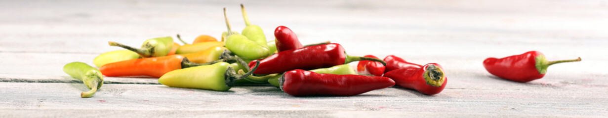 Pepper. Mexican hot chili peppers colorful mix habanero poblano serrano jalapeno on wood.