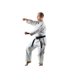 Athlete doing formal exercises on an isolated white background.