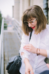 business woman with phone walk in the city