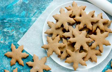 Christmas cookies, gingerbread snowflake cookies for Christmas and New Year holidays