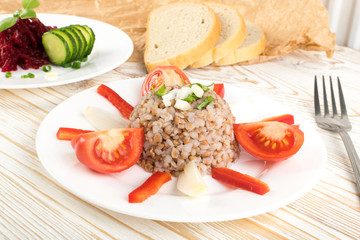 Buckwheat Porridge or Russian Kasha on Wood Rustic Background