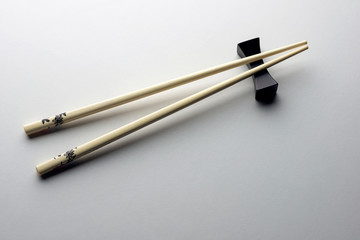 Rice chopsticks decorated on a white background