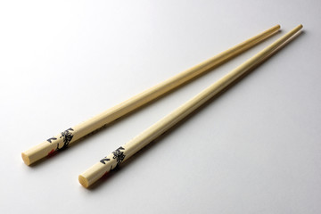 Rice chopsticks decorated on a white background