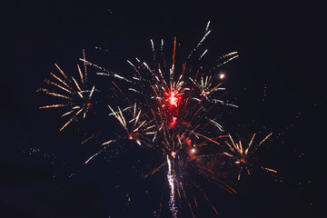 Fireworks light up the night sky, New Year celebration.