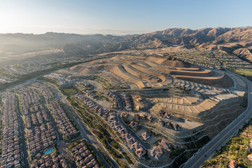 Aerial view of Porter Ranch hilltop construction grading above the San Fernando Valley in Los Angeles, California.  