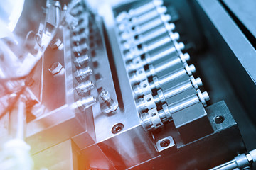 engine of machine with bolts and coils