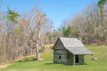 Fototapeta na wymiar Tiny old original log cabin on the Blue ridge Parkway