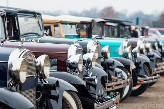 Row of vintage cars on a car show