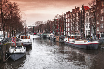 Fototapeta na wymiar Canal perspective, Amsterdam street view
