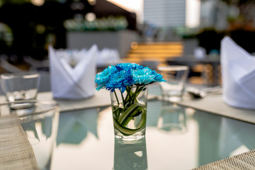 bouquet of  purple flowers on a table for dinner