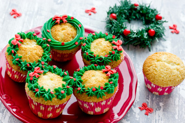 Christmas wreath cupcakes -  beautiful and delicious homemade cupcakes decorated with green cream and candy sprinkles, Christmas and New Year dessert