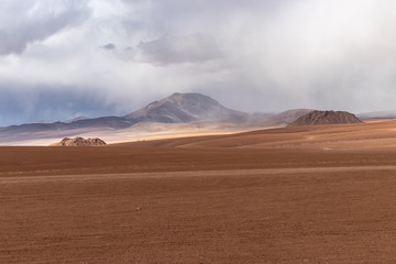 Fototapeta na wymiar Desert and mountains in the Alitplano Plateau, Bolivia