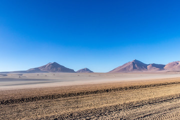 Fototapeta na wymiar Desert and mountains in the Alitplano Plateau, Bolivia