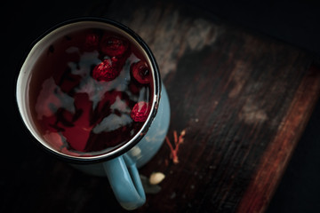 Decoction with dog rose in a cup Rosehip