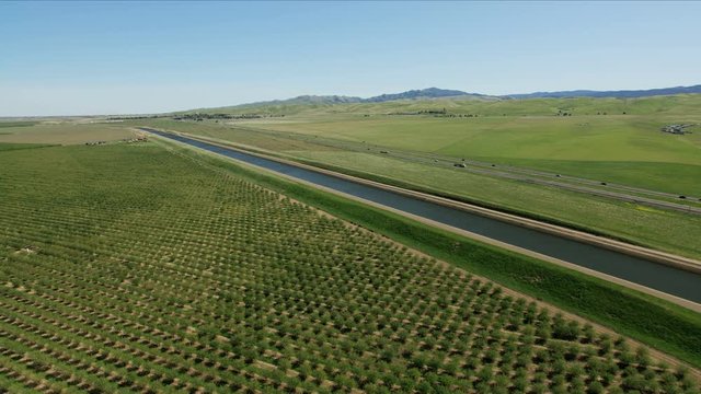 Aerial aqueduct natural organic crops growing Central Valley