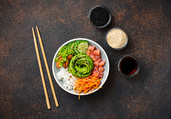 Hawaiian poke bowl with salmon, rice and vegetable