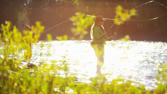 St Mary River Male And Female Freshwater Fly Fishing Sunrise Canada