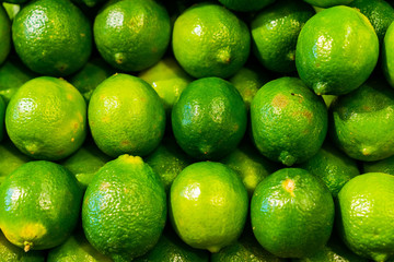 Fresh green lime at a grocery market