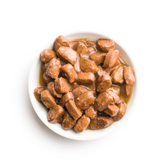 Meal for dog or cat. Canned meat with sauce.