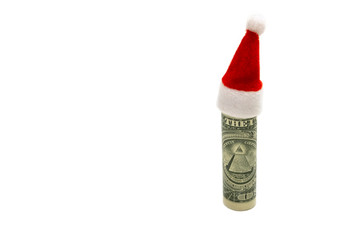 Santa's claus souvenir red hat is worn on one dollar rolled up. The concept of financial costs for the New Year holiday and Christmas. Isolated