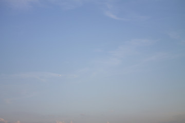 Fototapeta na wymiar blue sky and white huge fluffy clouds on it
