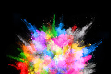 abstract colored dust explosion on a black background.abstract powder splatted background,Freeze...