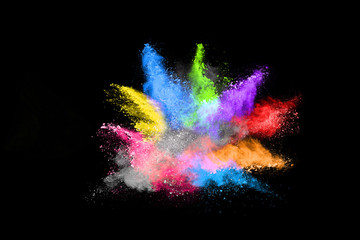 abstract colored dust explosion on a black background.abstract powder splatted background,Freeze...
