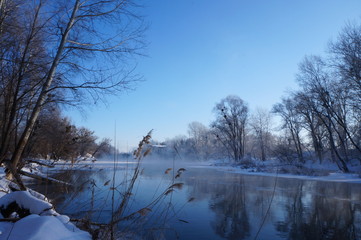River fully covered with ice and snow