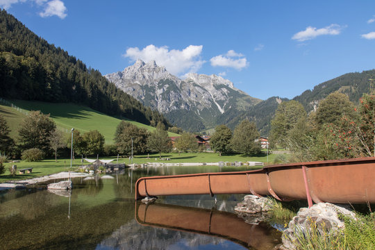 mountain landscape with lake next to Werfenweng