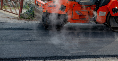 laying new asphalt on disconnected road