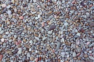 sea pebbles background of sea stones / background photo natural colors