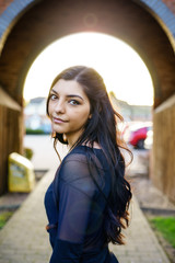 Obraz premium Young British Lady Portrait with blurry bokeh background.