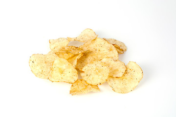 Potato chips over white background