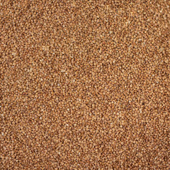 Background, texture, the rump. Buckwheat. Roasted buckwheat. Garnish. Ingredient, product, cook. Brown. Agribusiness, crop, organic farming. Dietary product.