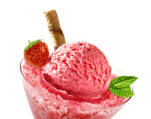 Scoop of strawberry ice cream in glass bowl isolated on white background