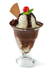 Vanilla sundae ice cream in cup with chocolate sauce and wafer isolated on white background