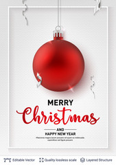 Red Christmas ball and text on light background.