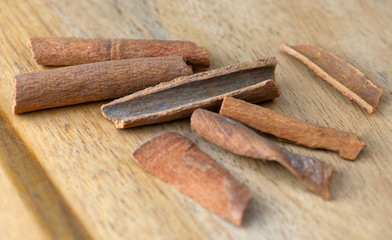 Cinnamon sticks on wooden table
