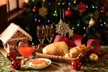bread with caviar, champagne and Christmas tree