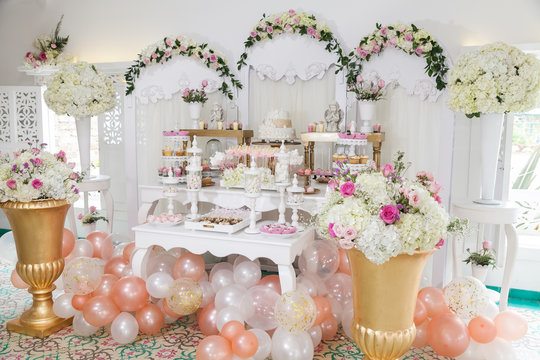 table with sweets decorated for children party reception