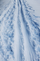 Winter. Ski tracks on the blue snow