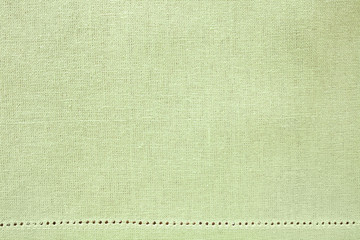 Flat Lay Light Green Fabric Background with decorative border