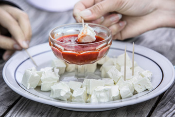 woman with cheese fondue