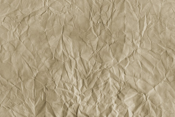 - Old coffee grunge paper texture. Vintage background for design and scrapbooking. Old, compressed and crumpled effect.