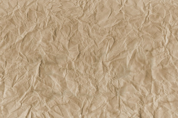 - Old coffee grunge paper texture. Vintage background for design and scrapbooking. Old, compressed and crumpled effect.