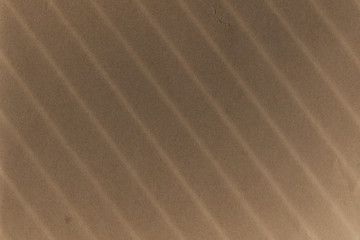 - Old coffee grunge paper texture. Vintage background for design and scrapbooking. Old, compressed and crumpled effect.