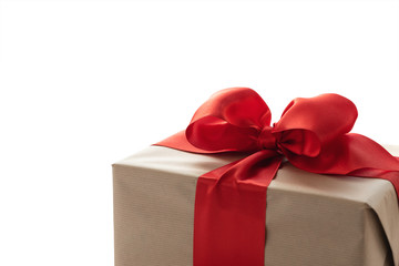 Gift box with red ribbon on white background